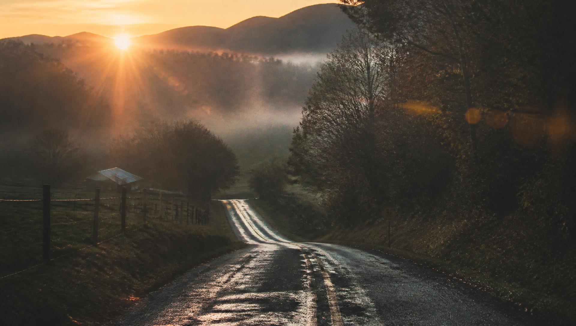 Fog lifting off a country road at sunrise in the North Georgia foothills